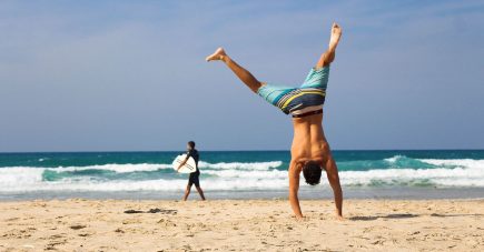 fulfilling dream of early retirement and doing cartwheels on a beach